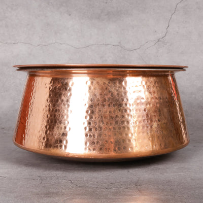 Copper rice pot close-up showing tin lining - non-toxic copper cooking pot
