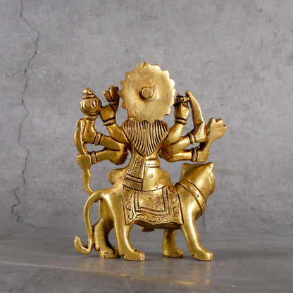 Detail of Sacred Brass Goddess Durga Idol - Artisanal Brass Hand-Hammered Texture and Quality Finish