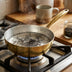 Non-toxic brass skillet 8-inch on stovetop - hand-hammered PFOA-free frying pan
