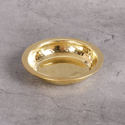 Brass small plate close-up showing hammered texture - tin-lined dessert plate