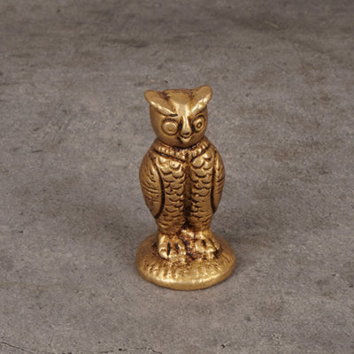 Owl statue close-up showing brass feather detail - decorative brass sculpture