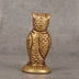 Brass owl on bookshelf - hand-cast owl statue for home office and study decor