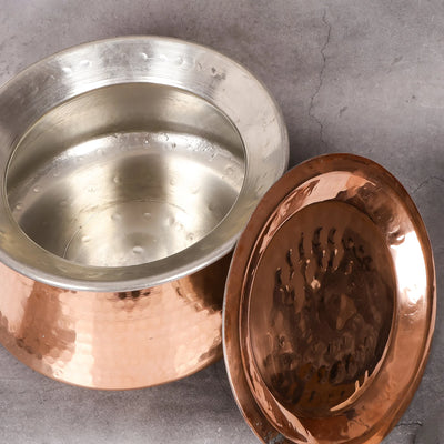 Copper pot close-up showing tin lining and hammered texture - non-toxic dutch oven